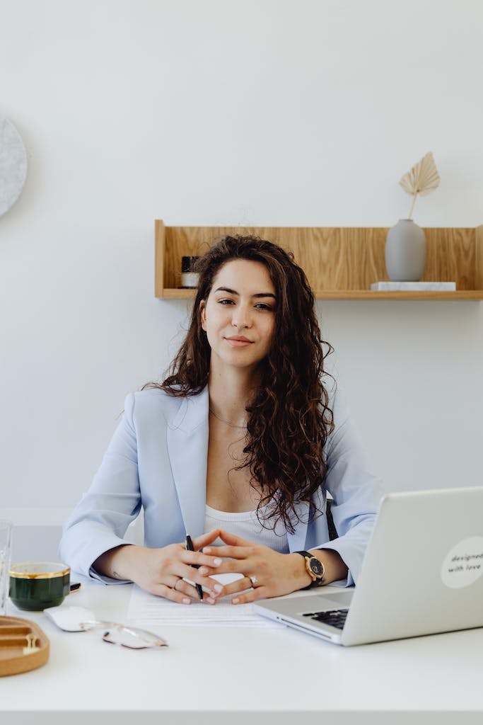 A Businesswoman Working Inside An Office 8528744 683x1024 1