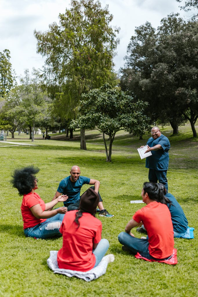 people-sitting-on-green-grass-7551457-683x1024.jpg Alps Edition - Image 3